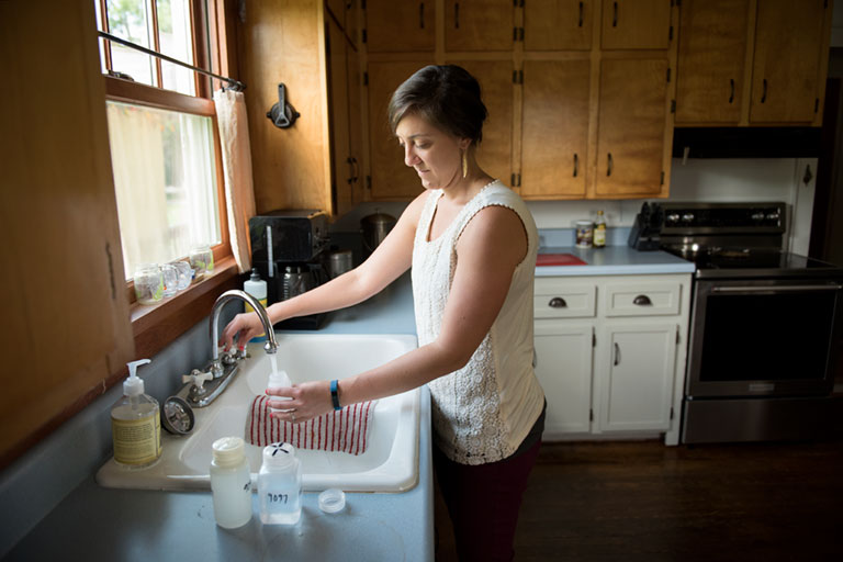 image of taking water samples from a a kitchen sink